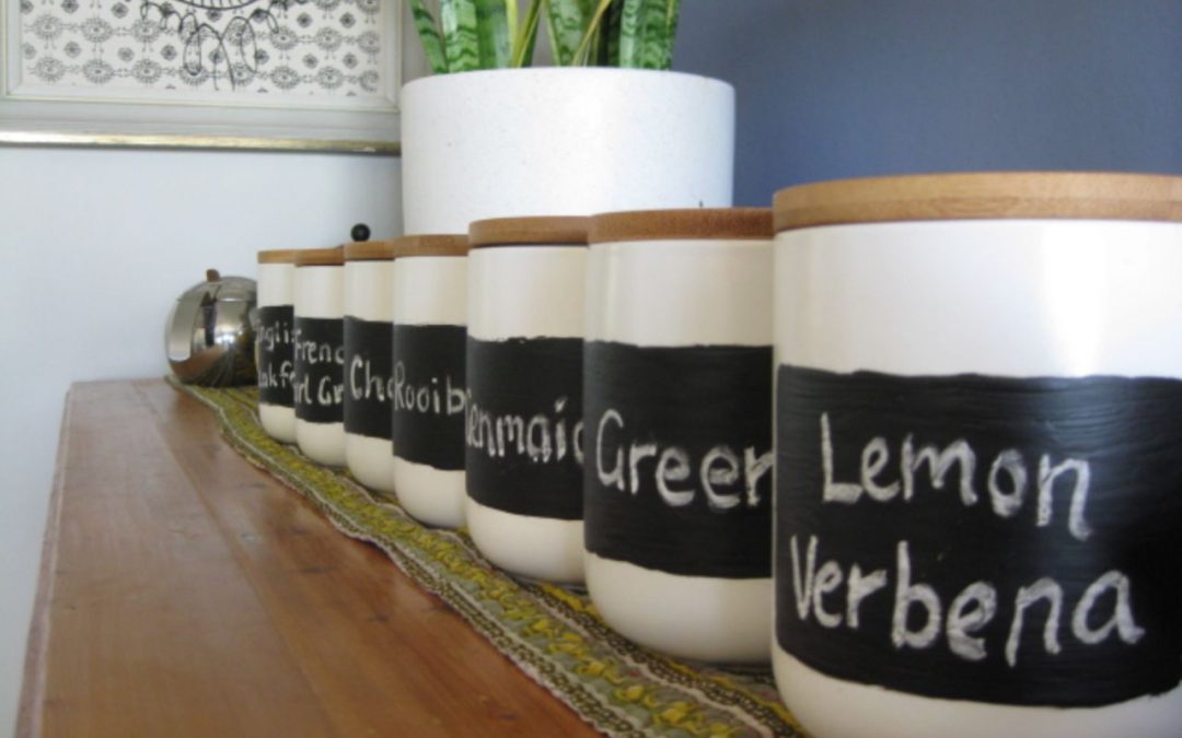candle canisters repurposed for loose leaf tea